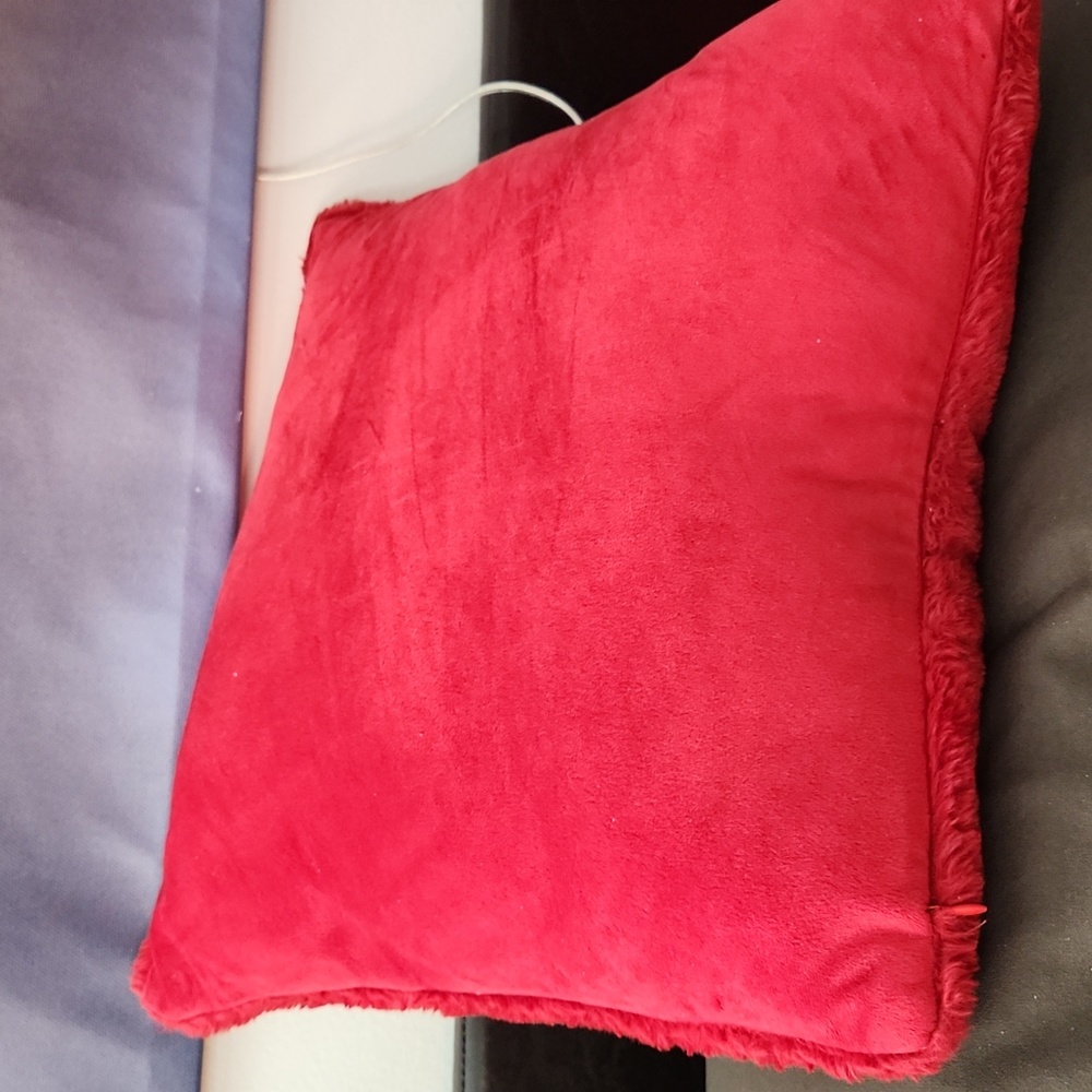 Cushion with cover in pink